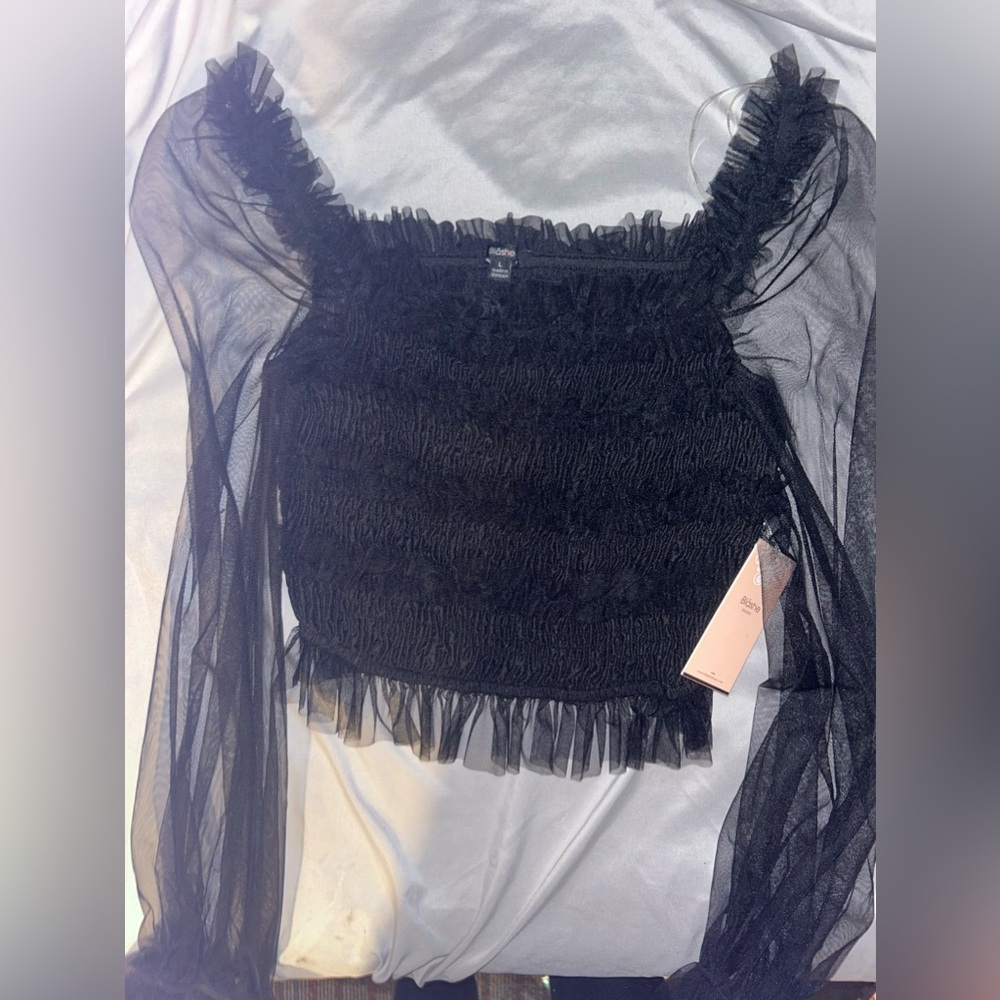 Black ruffled crop top
